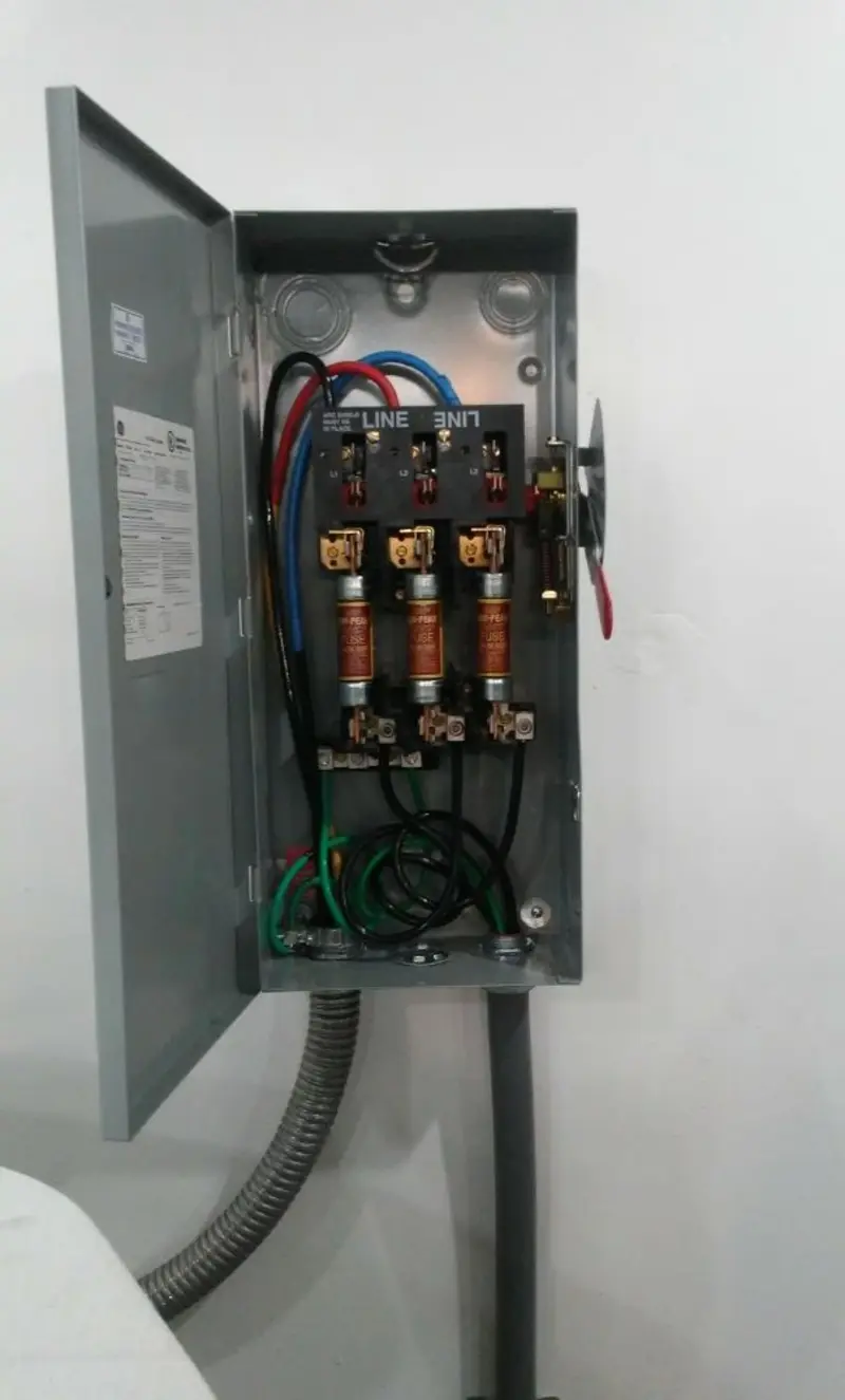 Three-phase disconnect switch installed for Smoke Detector Installation in Harlan